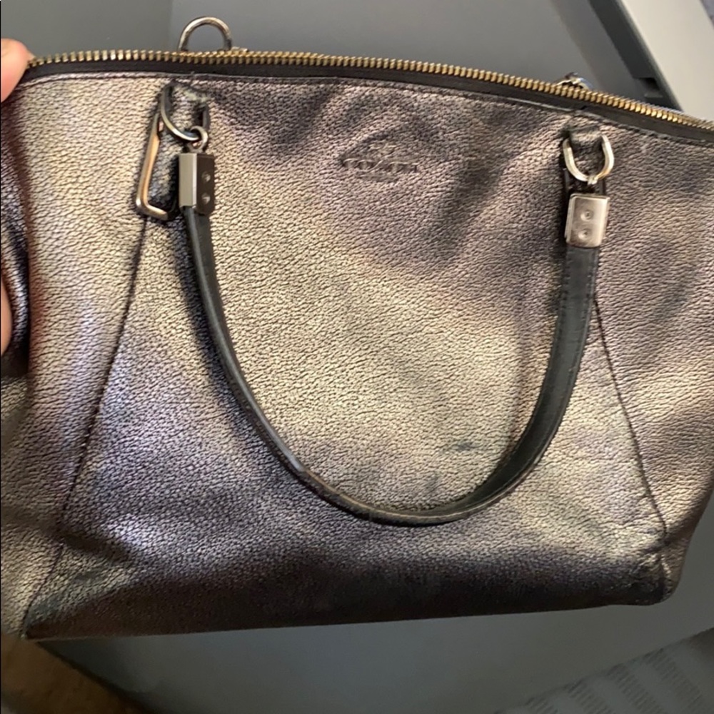 Coach bag. Needs a cleaning.